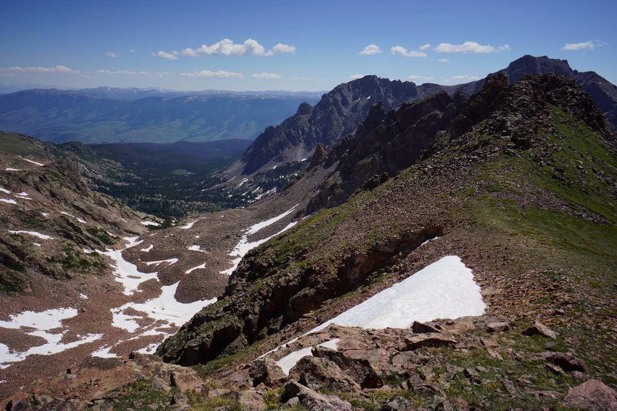 overlooking south rock creek basin from hail peak ridgeline in the gore mountain range, colorado in july
