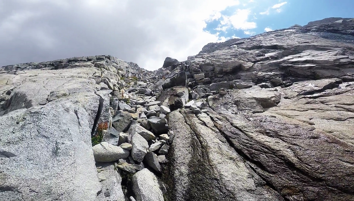 steep rock chute on goethe lakes side of alpine col